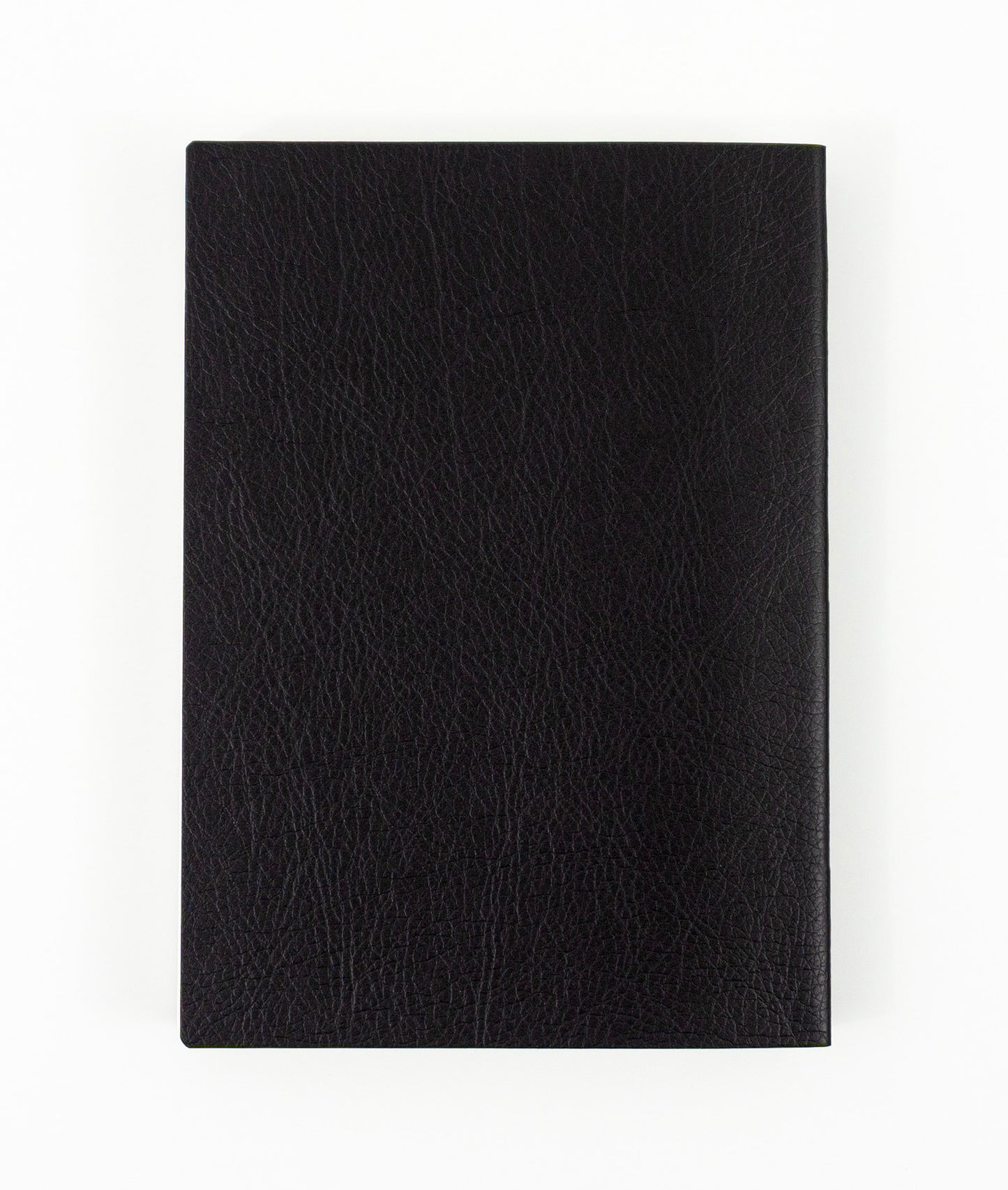 Black A6 notebook on a white background (back cover)